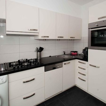Schelvis Apartments Зандфорт Экстерьер фото